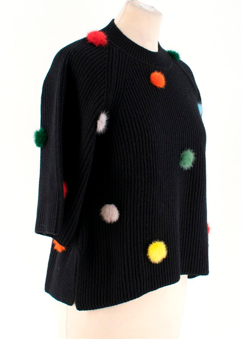 Fendi Black Cashmere Jumper with Mink Fur PomPoms

-Black cashmere jumper with multicoloured mink pompoms
-Side slits at the hemline
-3/4 length sleeves
-Ribbed collar

Please note, these items are pre-owned and may show signs of being stored even
