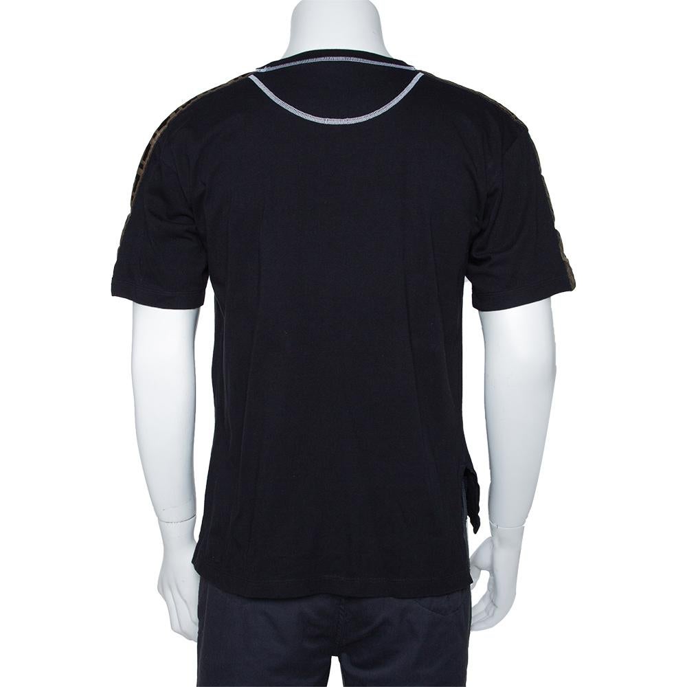 Add the right dose of high-fashion to your casual style with this cotton t-shirt from Fendi! It brings short sleeves as well as the logo print on the front. You can team it with a pair of jeans, shorts and footwear of your choice.

Includes: