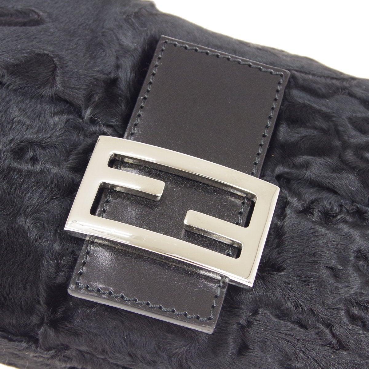 Pre-Owned Vintage Condition
Fur
Leather Trim
Silver Tone Hardware
Satin Lining
Measures 9.75