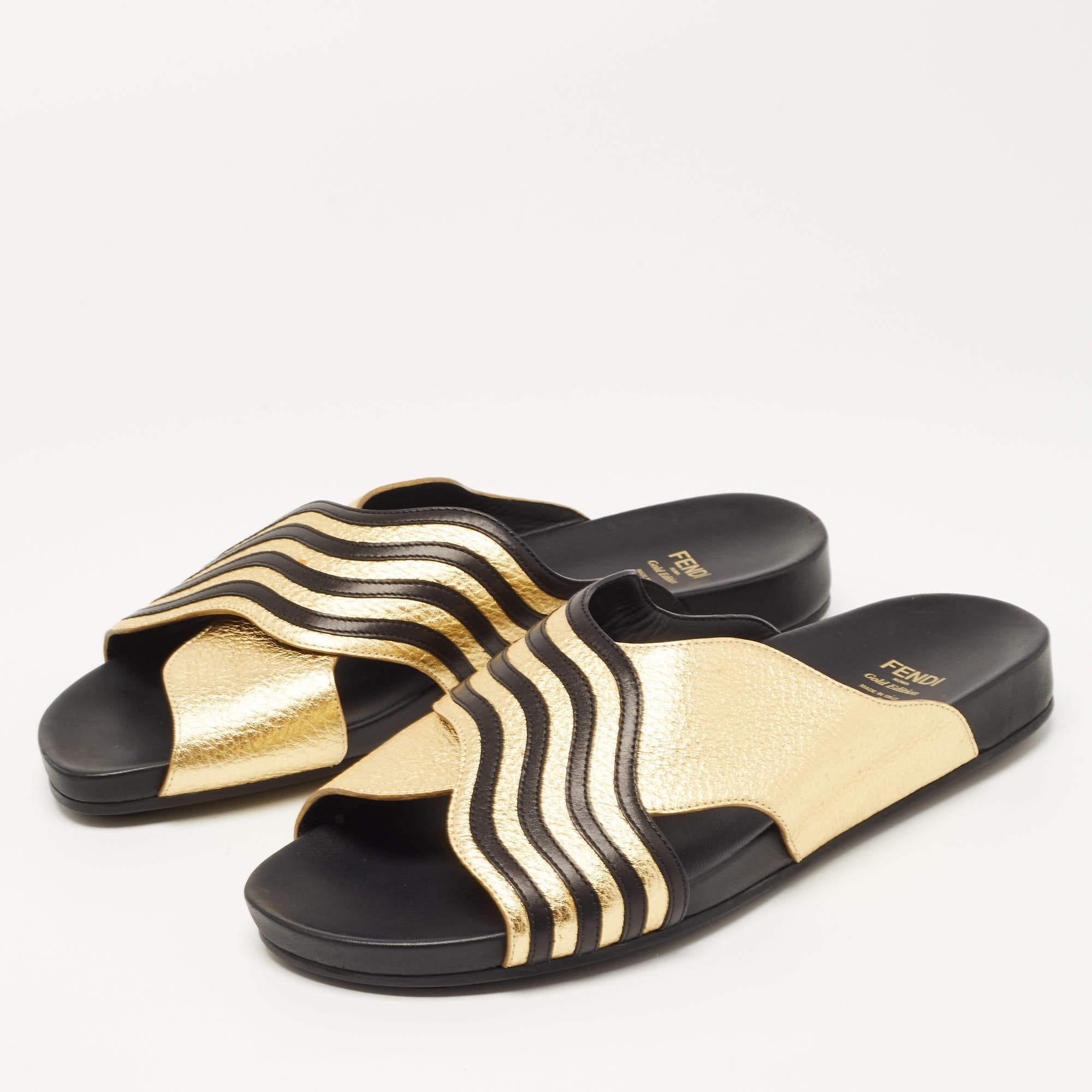Fendi's rubber slides for women have leather wave straps on the uppers. They're perfect for the beach, vacation days, or everyday use.

