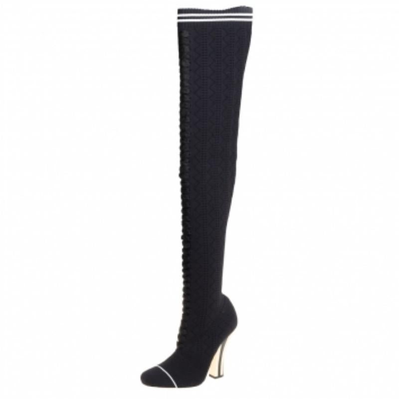 Crafted in Italy, Fendi's boots are stylish, edgy, and sporty. They are knit fabric in a sock-like silhouette adorned with laces, round toes, and a snug fit. These boots are elevated on striped 11.5 cm heels. Style them with a short dress for a