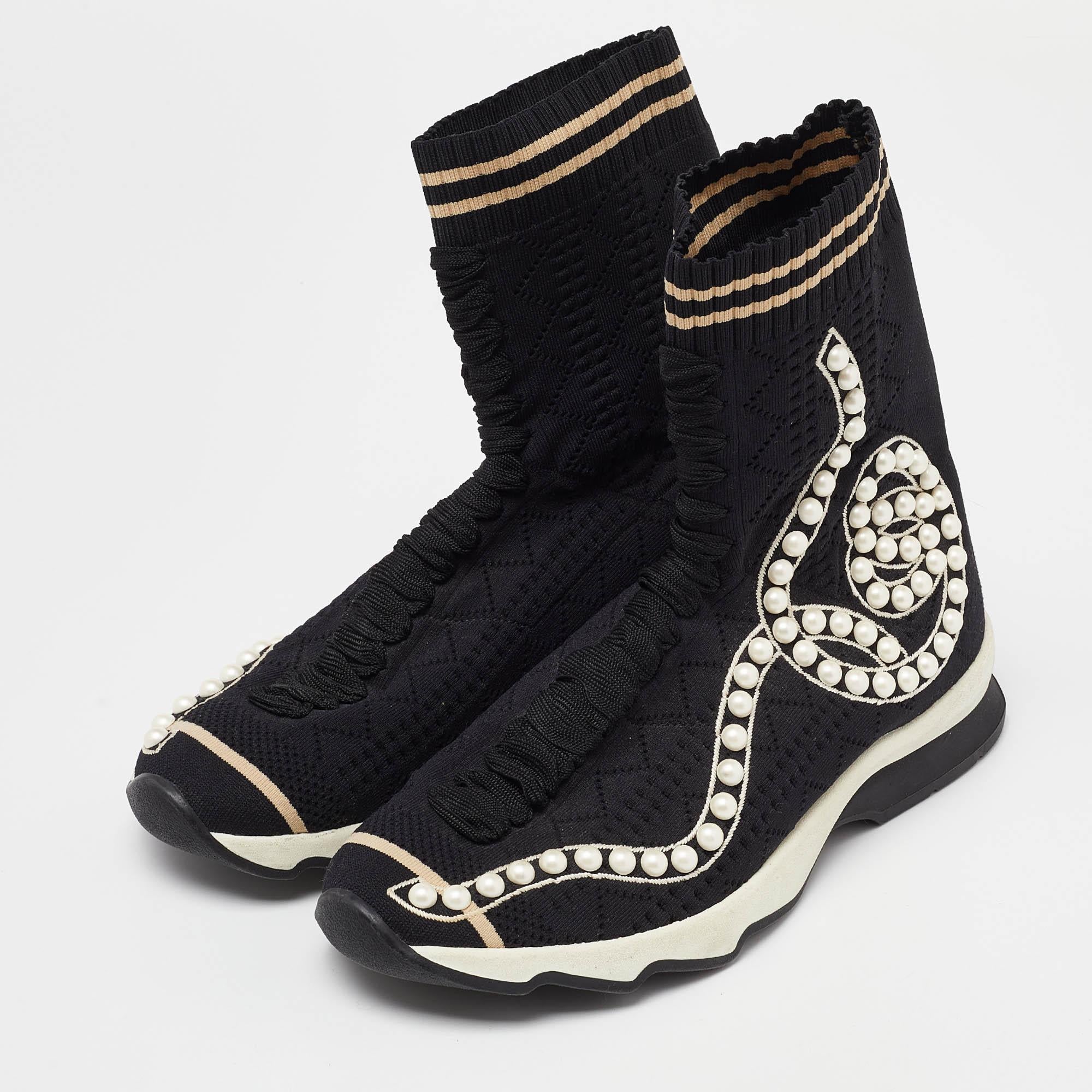 Coming in a classic silhouette, these designer sneakers are a seamless combination of luxury, comfort, and style. These sneakers are finished with signature details and comfortable insoles.