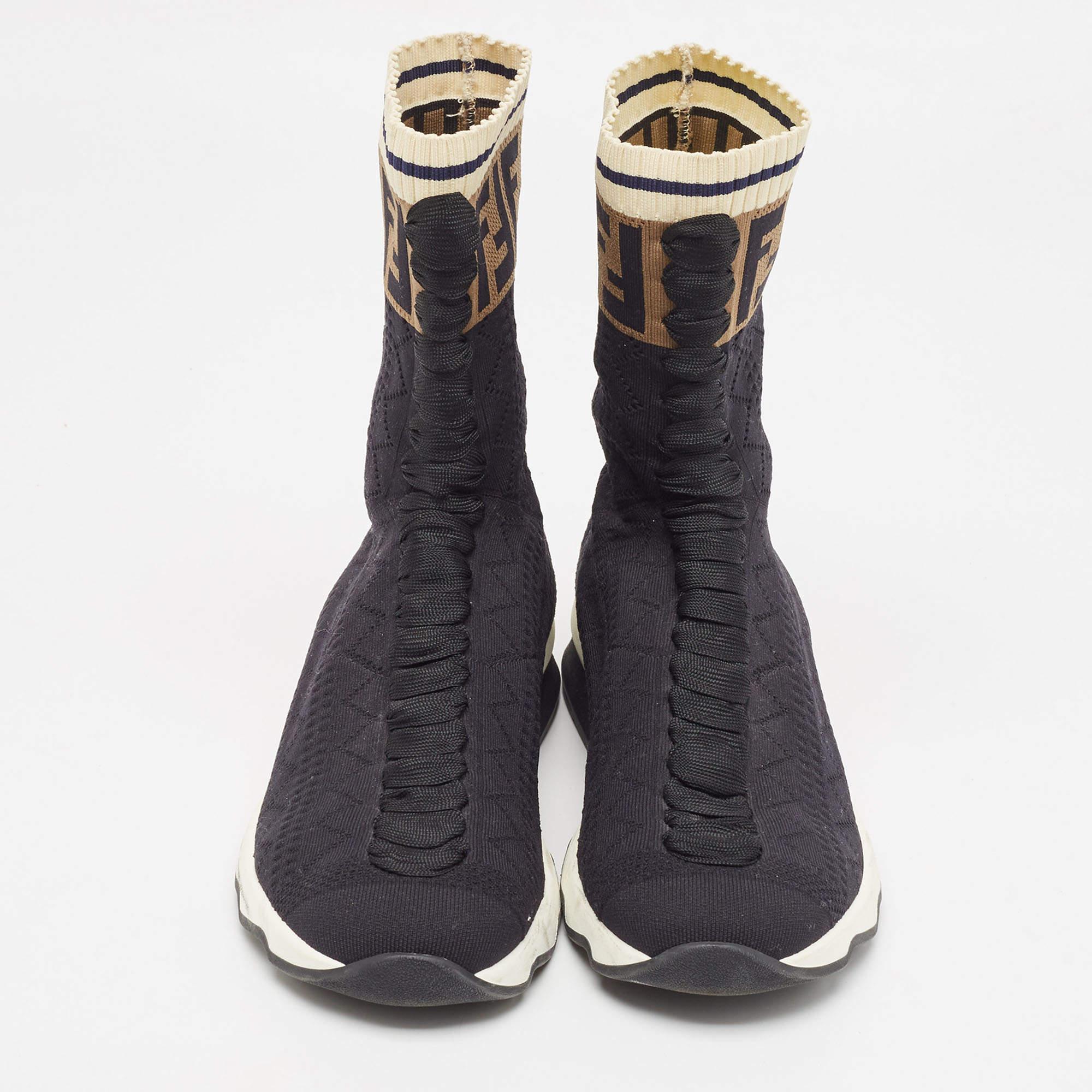 These stylish Rockoko sneakers come from the house of Fendi. Crafted in Italy, they are made from leather in a lovely shade of black. They are styled with lace-up fronts, sock-style FF motif detailing, and rubber soles.

Includes
Original Dustbag