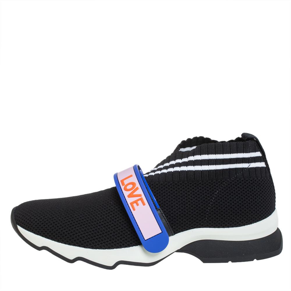 Enjoy footwear ease with this pair of Rockoko sneakers by Fendi. They've been crafted from black knit fabric and designed with monochrome trims and FENDI-LOVE detailed velcro straps on the uppers. Equipped with comfortable fabric-lined insoles and
