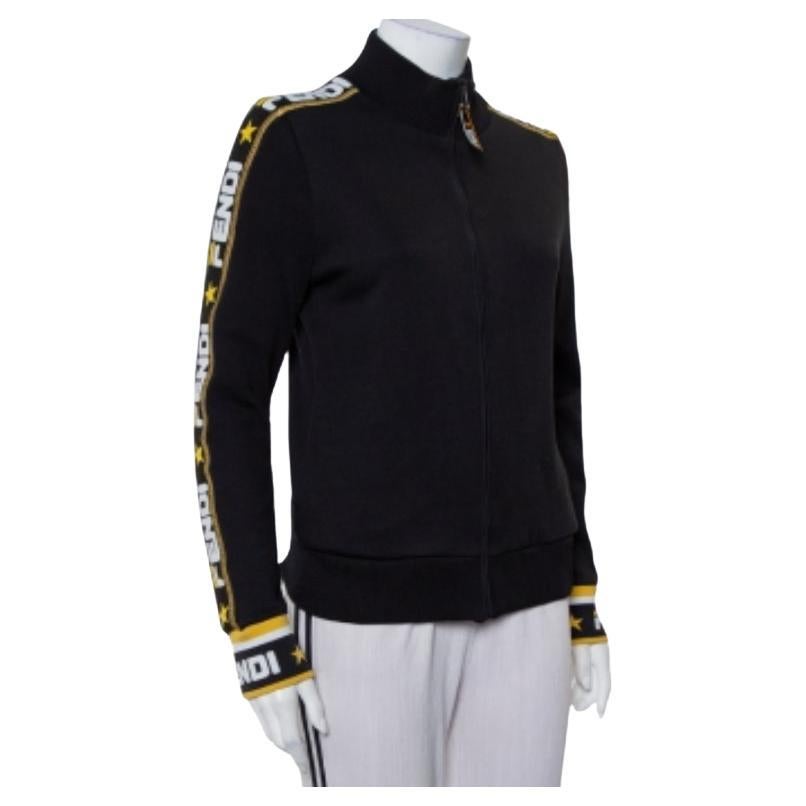 This sweatshirt from Fendi promises to add oodles of effortless style to your wardrobe. It is made of a cotton blend in a black shade and features logo details on the shoulders, long sleeves, and at the back,  It comes with a front zip closure and