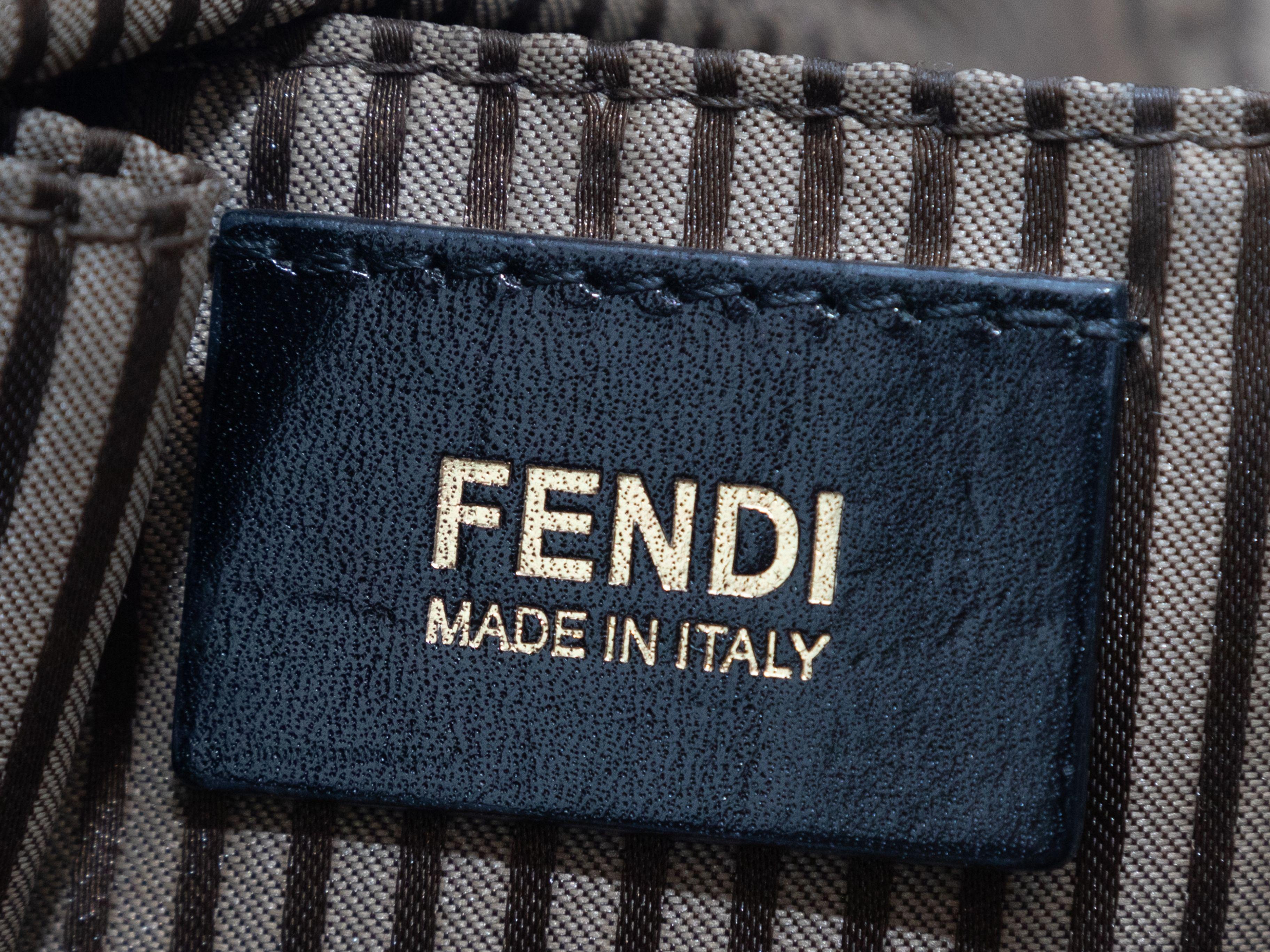 Product Details: Black Fendi Large Leather Chameleon Bag. The Chameleon bag features a leather body, gold-tone hardware, dual flat top handles, an optional flat shoulder strap, and a top zip closure. 16