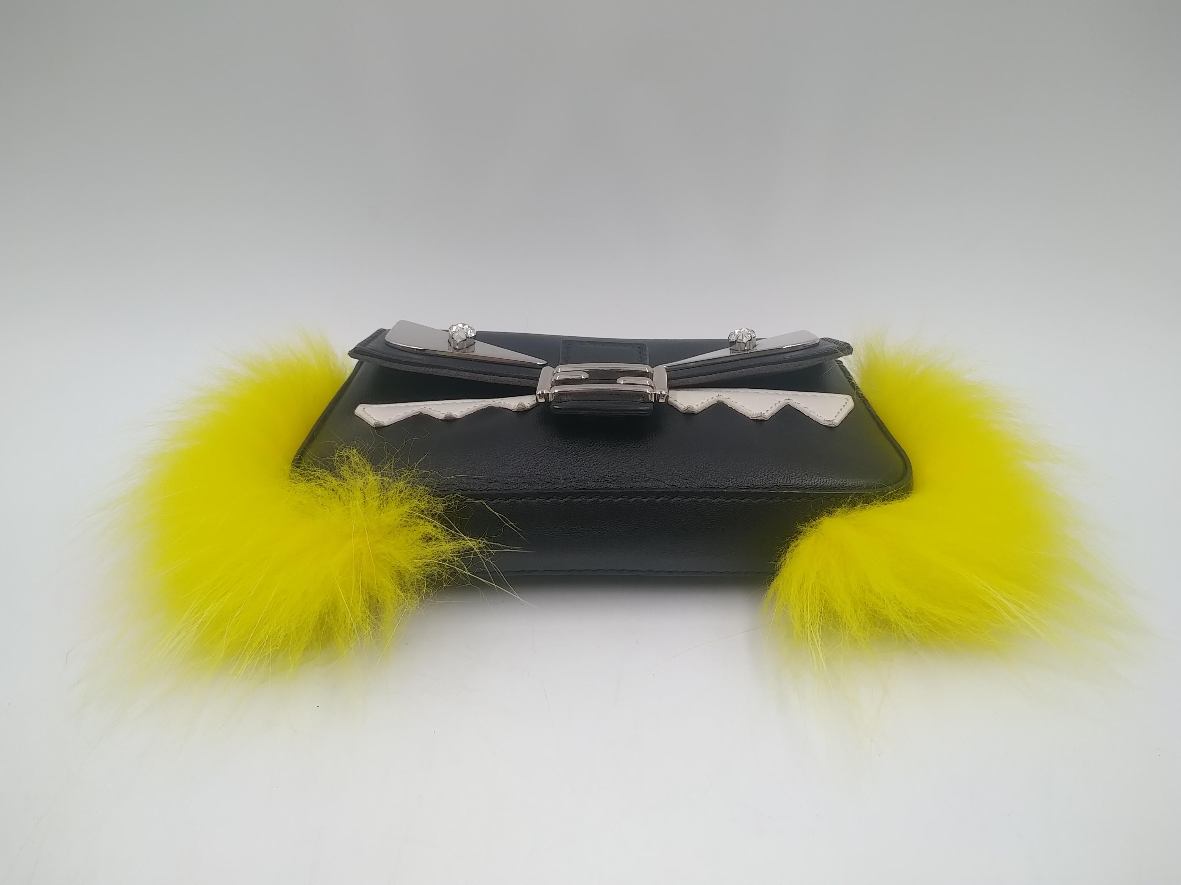 black and yellow purse