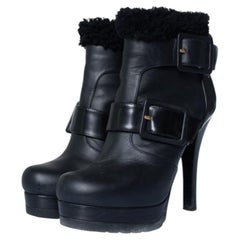 Fendi, black leather ankle boots with shearling