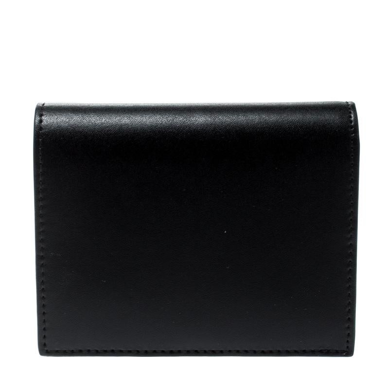 This bifold wallet from Fendi brings along a touch of luxury and immense style. It comes crafted from leather and is equipped with compartments and multiple card slots just so you can neatly carry your essentials.

Includes: Original Box

