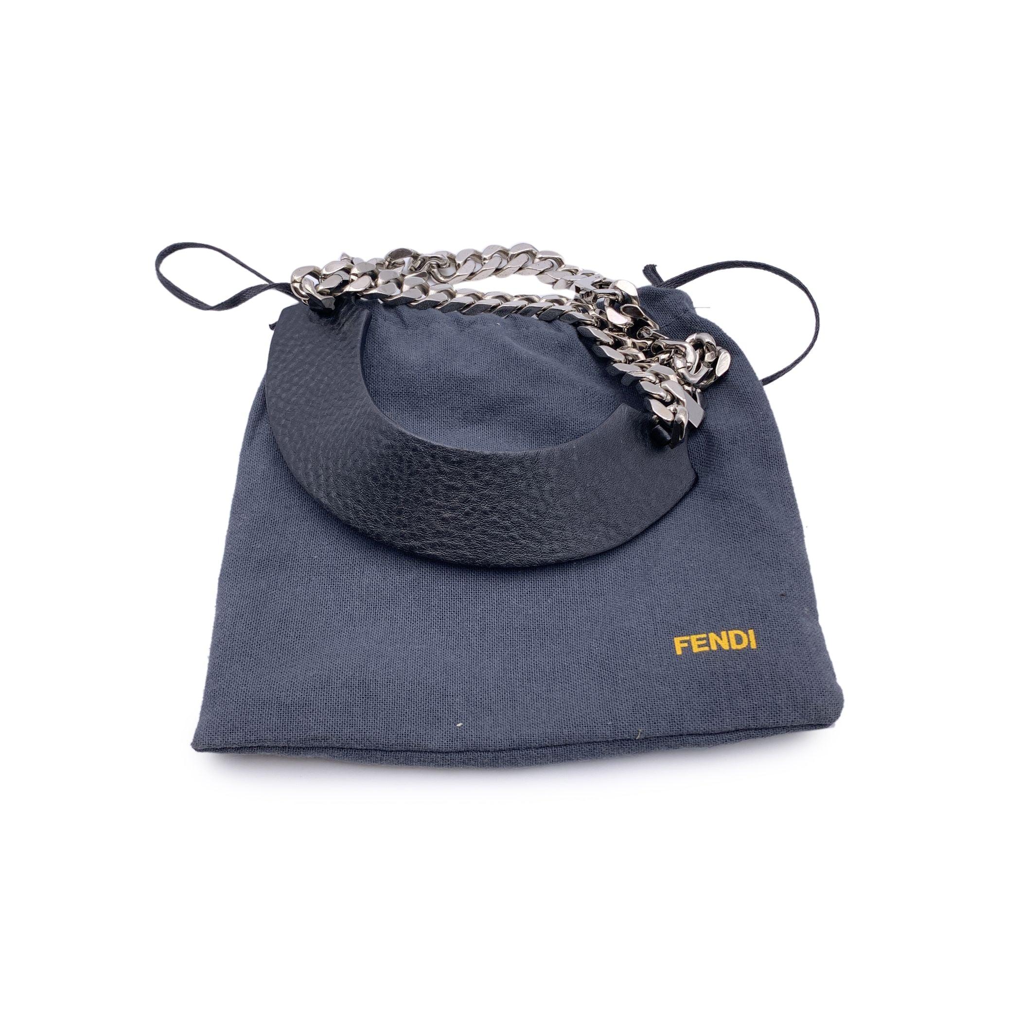 Beautiful black leather choker necklace with silver metal cuban chain from Fendi. Black grained calf leather with silver metal chain. Total lenght: 19 inches - 48.2 cm. Made in Italy. Condition A - EXCELLENT Gently used. Please, look carefully at