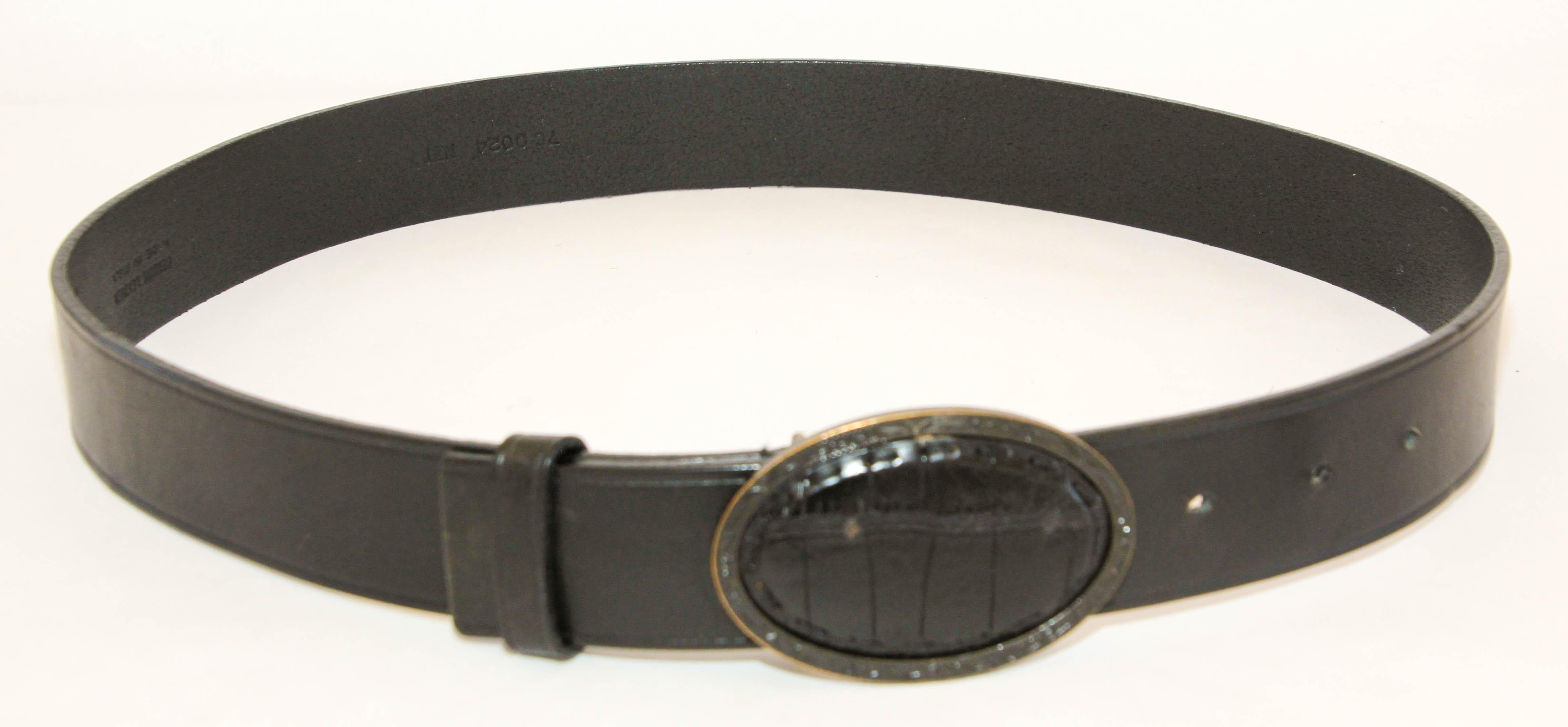 FENDI Black Leather Crocodile Cowboy Belt.
Oval shape belt buckle in antiqued brass with crocodile leather inset .
Dress up or dress down, this belt can be worn for any occasion. 
The oval shape buckle is 3.5