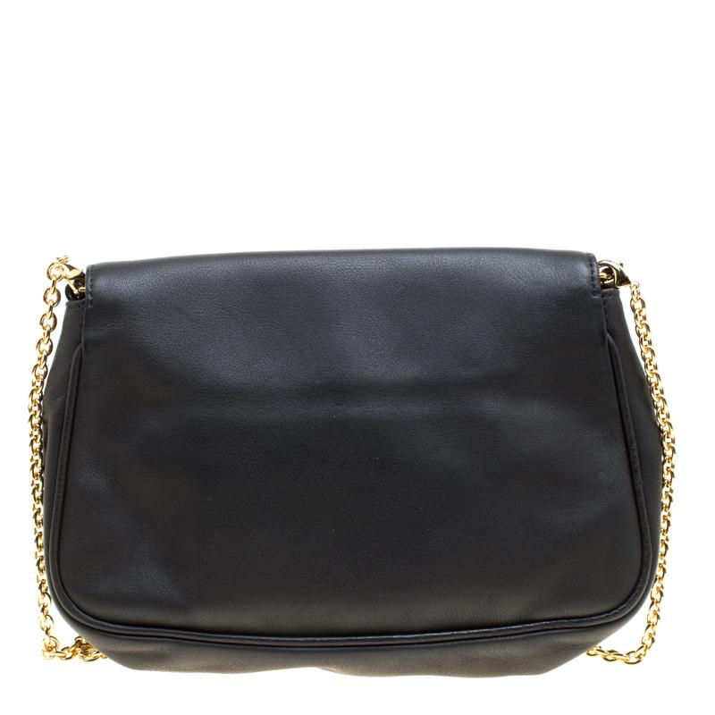 Pair this Fendi bag with suitable outfits for a glam look. This modern leather bag will hold the things you cannot do without in its fabric interior. This black bag is complete with a shoulder chain.

Includes: Original Dustbag, Info Card
