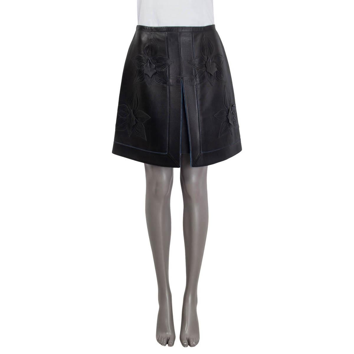 100% authentic Fendi pleated knee-length skirt in black lamb leather (100%). Features floral leather applications and a front slit. Opens with a zipper at the back. Unlined. Has been worn and is in excellent condition.

Measurements
Tag