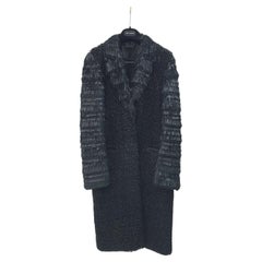 Fendi  Manteau en cuir noir à franges et à boucles Sz.42