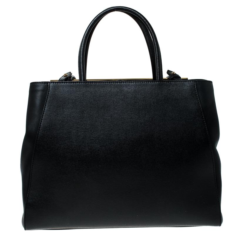 Fendi's 2Jours tote is one of the most iconic designs from the label and it still continues to receive the love of women around the world. Crafted from black leather, the bag features double rolled handles. It is also equipped with a fabric interior