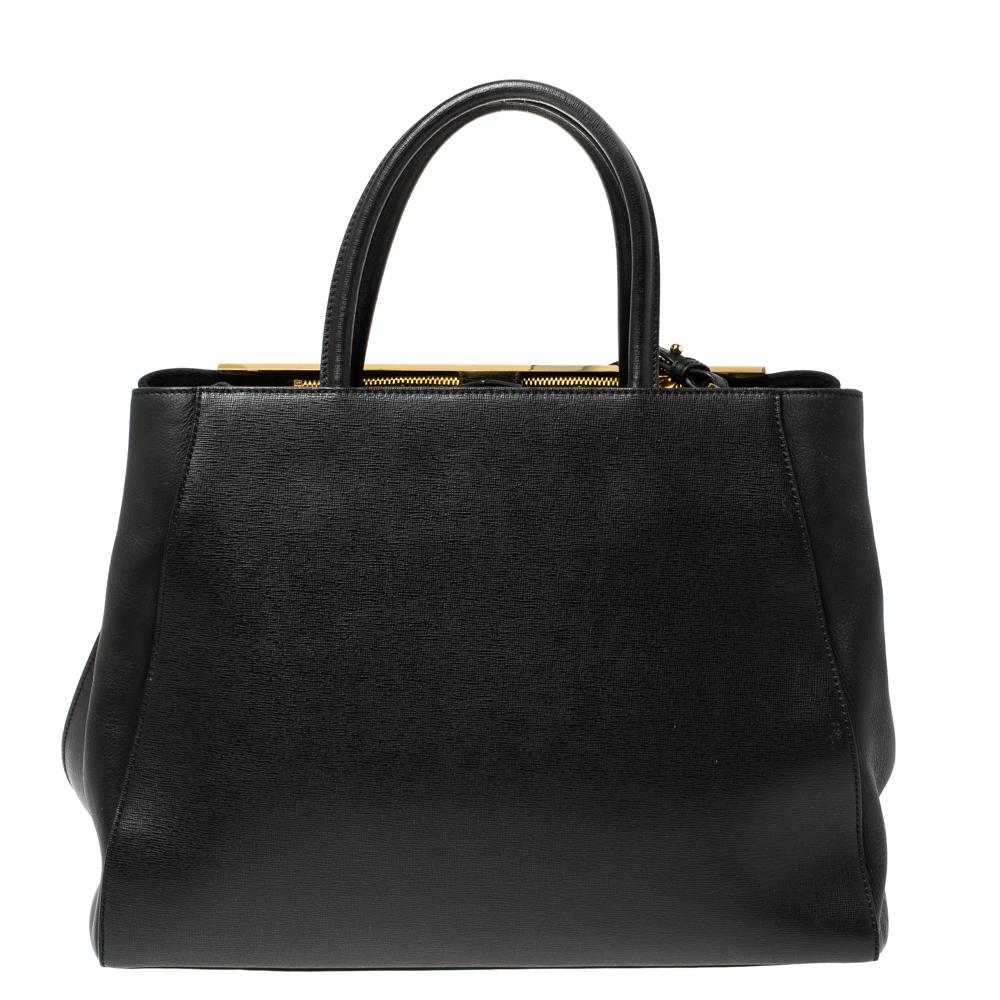 Fendi's 2Jours tote is one of the most iconic designs from the label and it still continues to receive the love of women around the world. Crafted from black leather, the bag features double rolled handles. It is also equipped with a canvas and