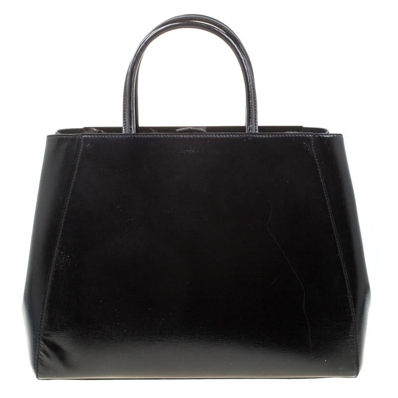 Fendi's 2Jours tote is one of the most iconic designs from the brand and it still continues to receive the love of women around the world. Crafted from black leather, the bag features double handles and a shoulder strap. It is also equipped with a