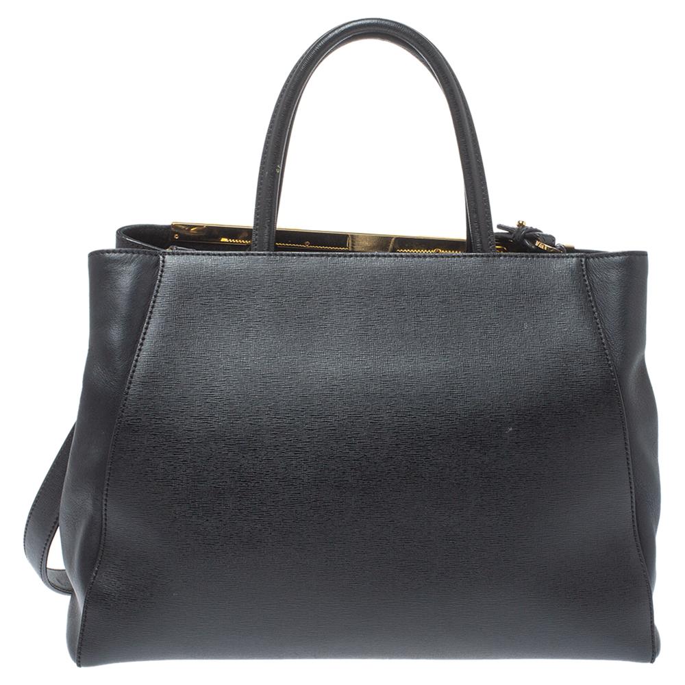 Fendi's 2Jours tote is one of the most iconic designs from the label and it still continues to receive the love of women around the world. Crafted from black leather, the bag features double rolled handles. It is also equipped with a fabric and