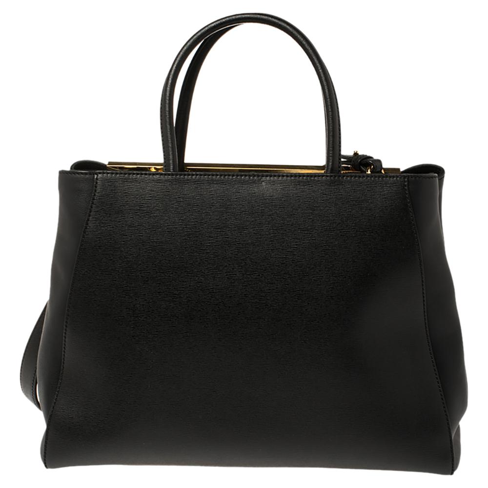 Fendi's 2Jours tote is one of the most iconic designs from the label and it still continues to receive the love of women around the world. Crafted from black leather, the bag features double rolled handles. It is also equipped with a fabric and