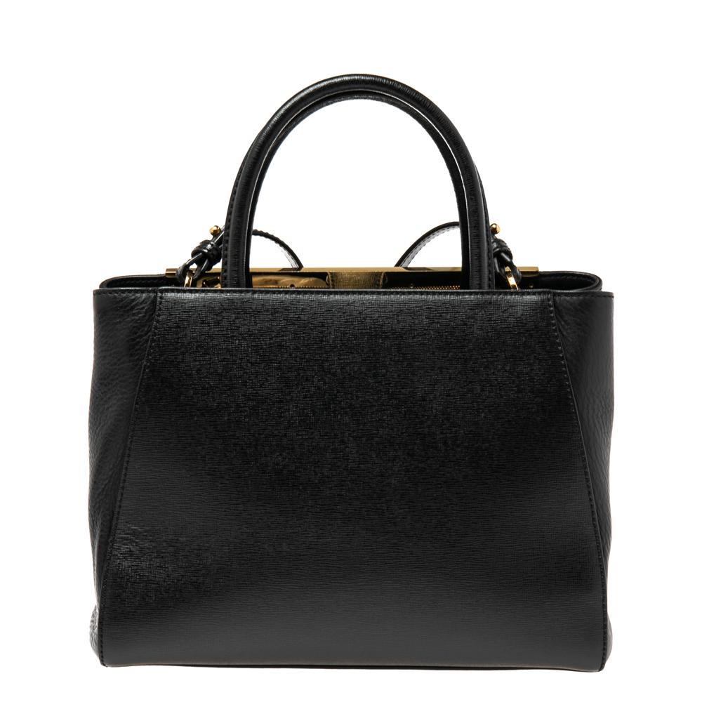 Fendi's 2Jours tote is one of the most iconic designs from the label and it still continues to receive the love of women around the world. Crafted from black leather, this bag features double handles and a shoulder strap. It is also equipped with a