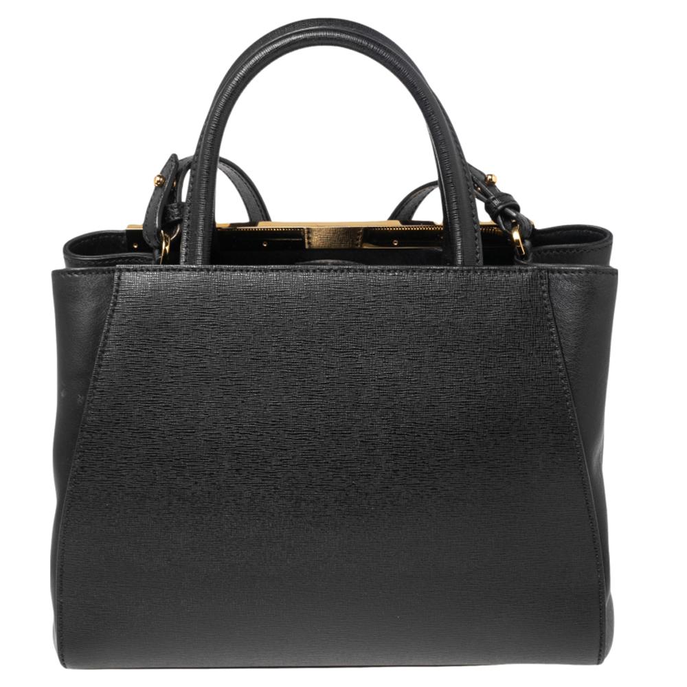 Fendi's 2Jours tote is one of the most iconic designs from the label and it still continues to receive the love of women around the world. Crafted from black leather, the bag features double rolled handles and a shoulder strap. It is equipped with a