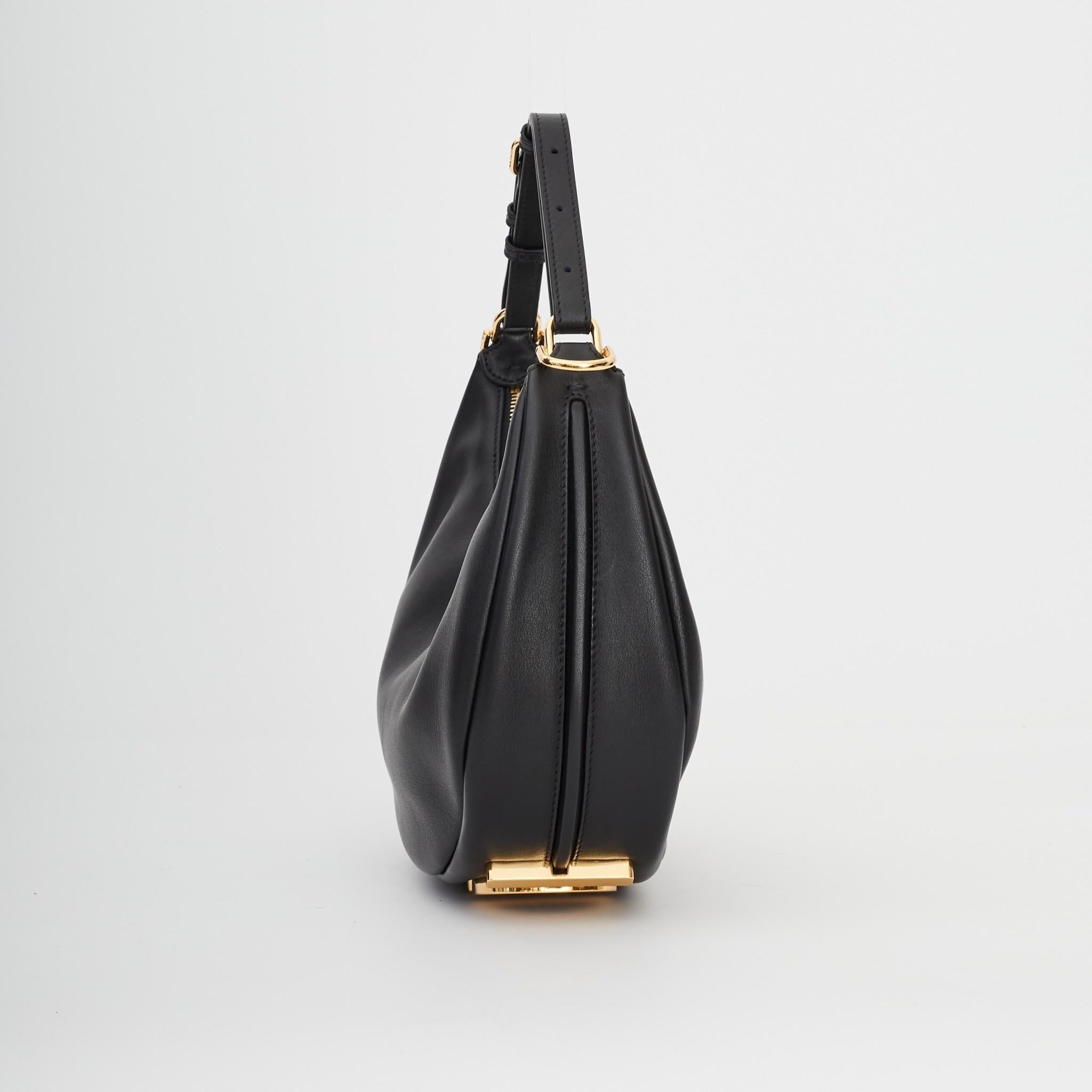 Retail.
Color: Black
Material: Calfskin Leather
8BR798
Made in Italy

Measurements~
Height 10”
Width 11”
Depth 4”
Drop: 7”

Comes with a dust bag.
Excellent condition.