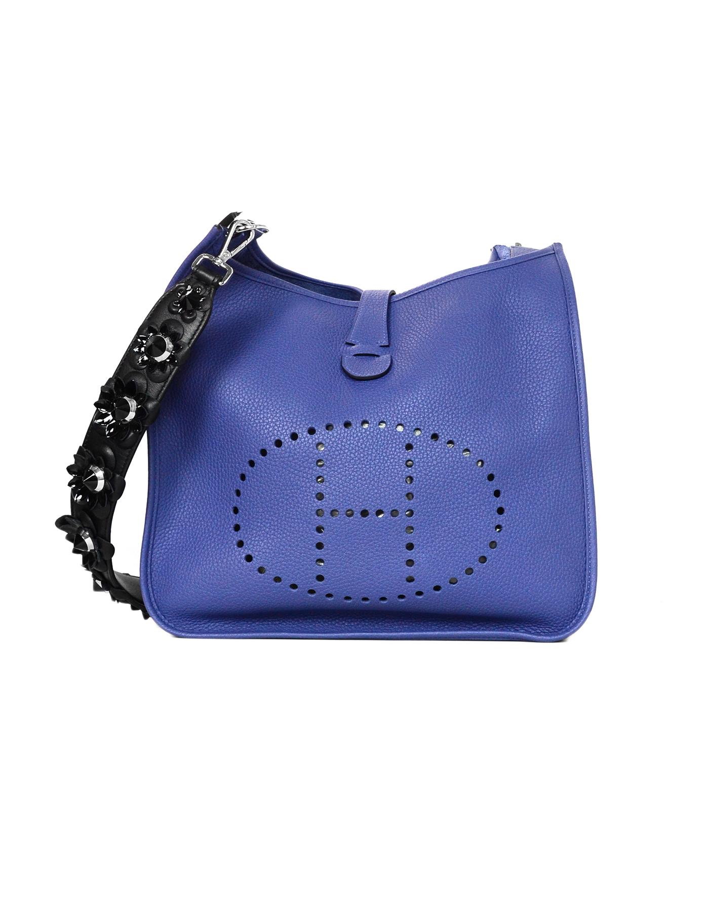 Fendi Black Leather Studded Flower Flowerland Strap You Bag Strap
Strap Only, Pictured with Item #100-14156 Hermes Blue Brighton Clemence Evelyne III 33 GM Bag

Color: Black, silver
Hardware: Silvertone
Materials: Leather and metal 
Lining: Black