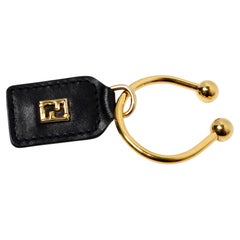 Fendi Black Leather & Yellow Gold-Tone Logo Keychain