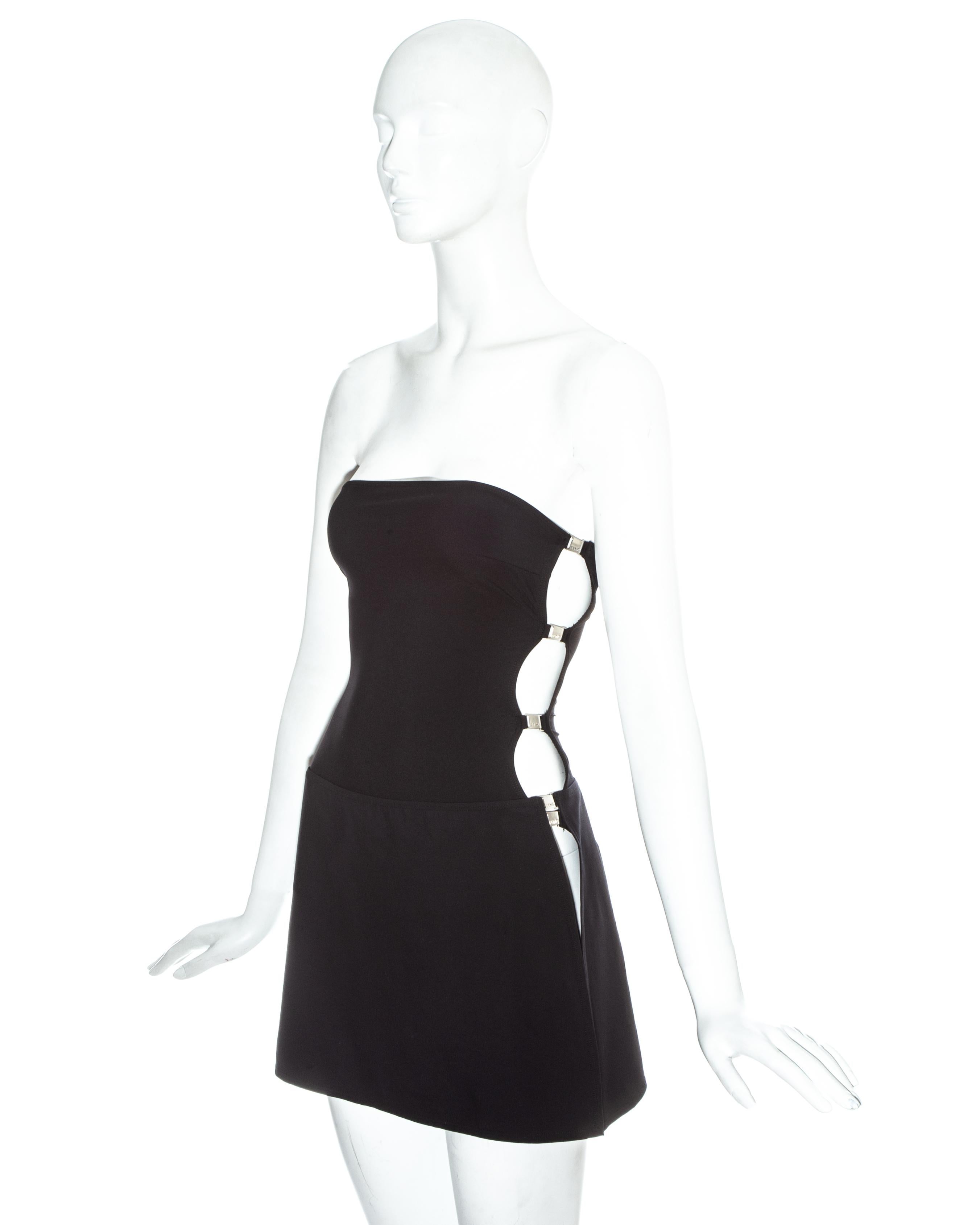 Fendi black lycra bodysuit and skirt set with Fendi engraved silver closures on the side. 

Spring-Summer 1997