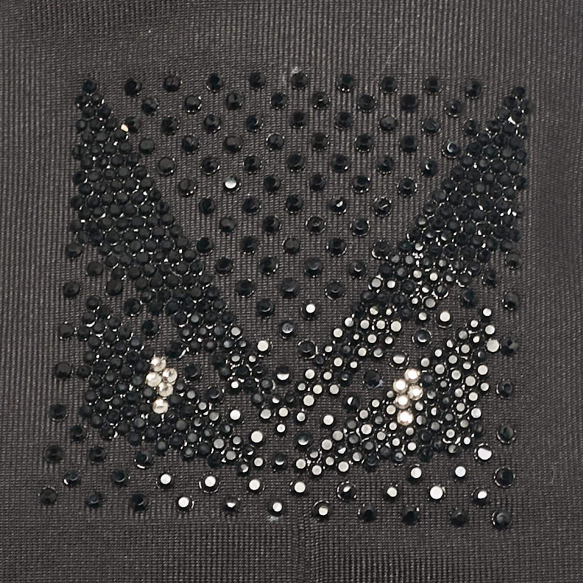 Made in Italy using silk this Fendi tie for men has an embellished monster eye detail on the front. This finely tailored accessory will add a charming finish.