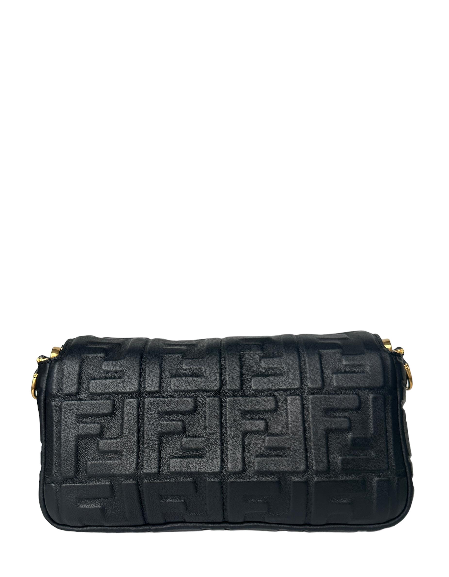 Fendi Black Nappa Embossed Logo FF 1974 Medium Baguette NM Bag w/ Two Straps

Made In: Italy
Color: Black
Hardware: Goldtone
Materials: Nappa leather
Lining: Textile
Closure/Opening: Flap top with magnetic closure
Exterior Pockets: None
Interior