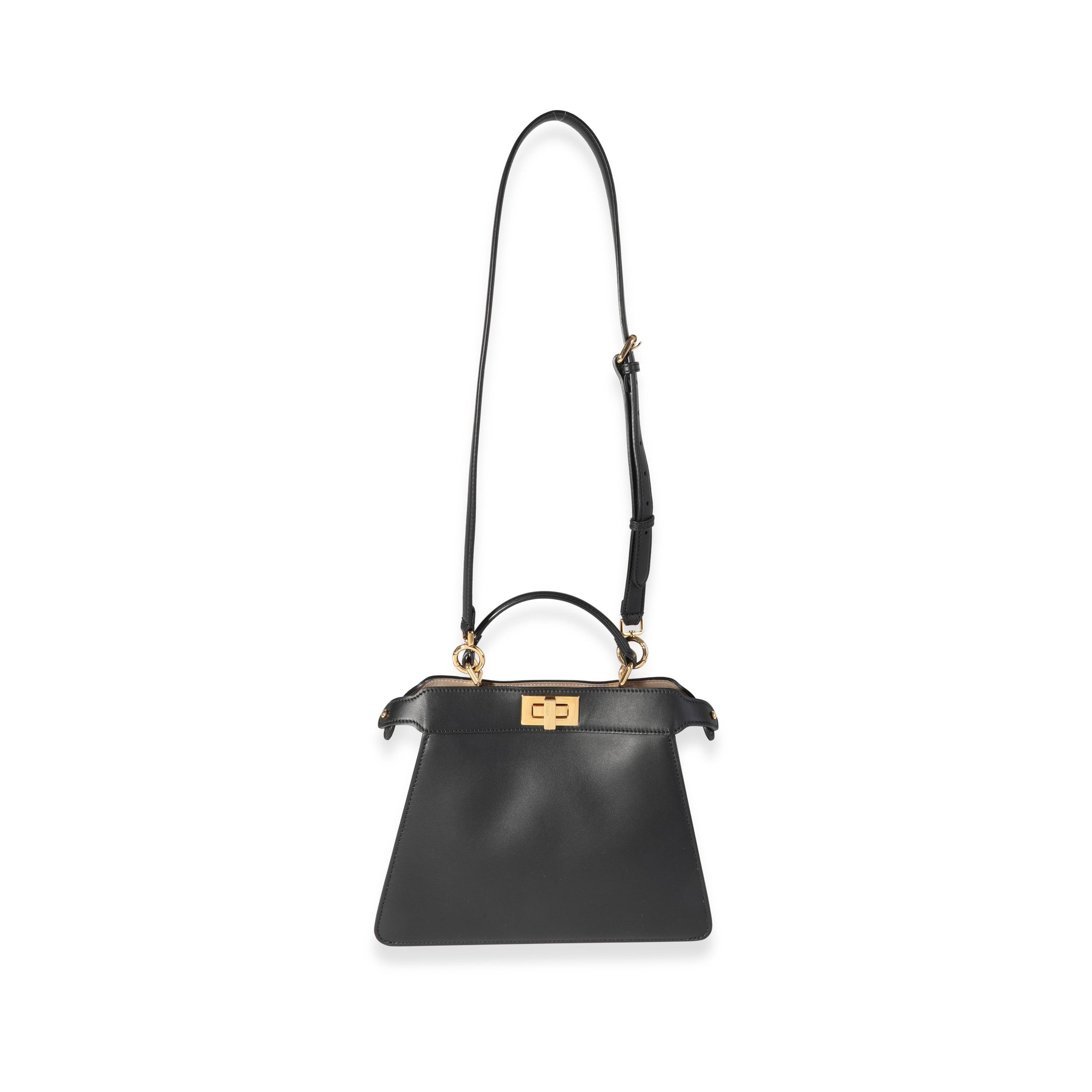 Listing Title: Fendi Black Nappa Leather Small Peekaboo ISeeU Bag
SKU: 120704
MSRP: 4800.00
Condition: Pre-owned 
Handbag Condition: Very Good
Condition Comments: Very Good Condition. Faint scuffing and press marks to exterior. Scratching to