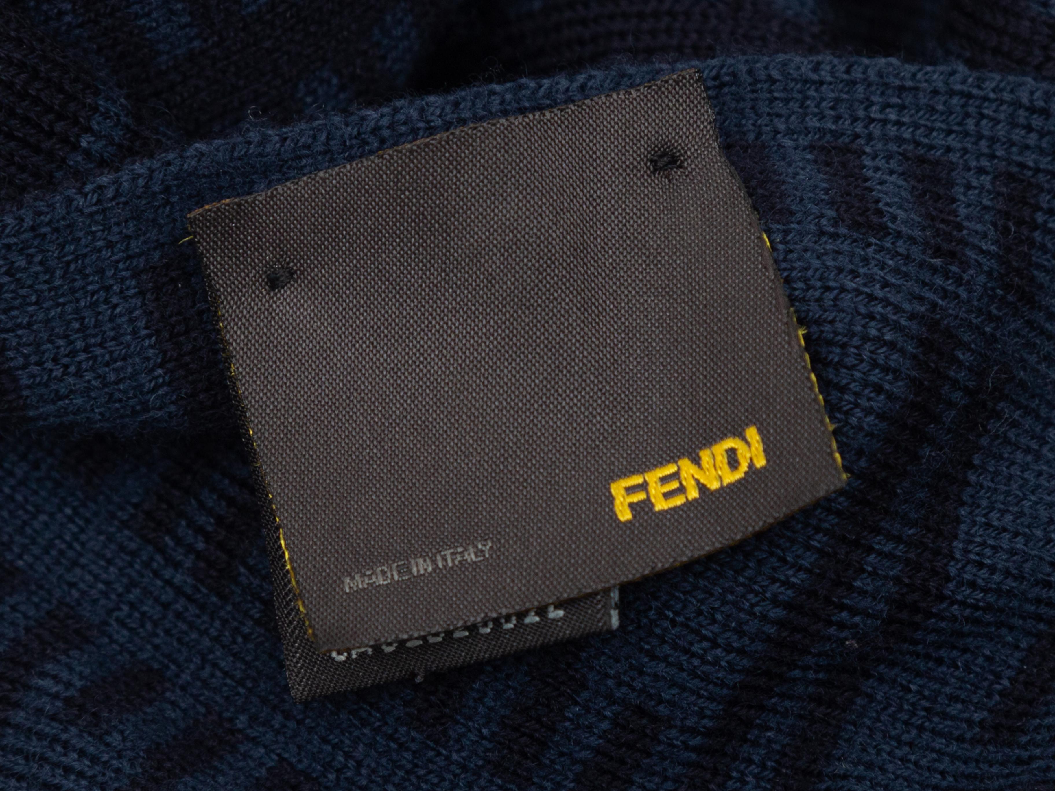Product details: Black and navy wool scarf by Fendi. Zucca intarsia pattern throughout. 61