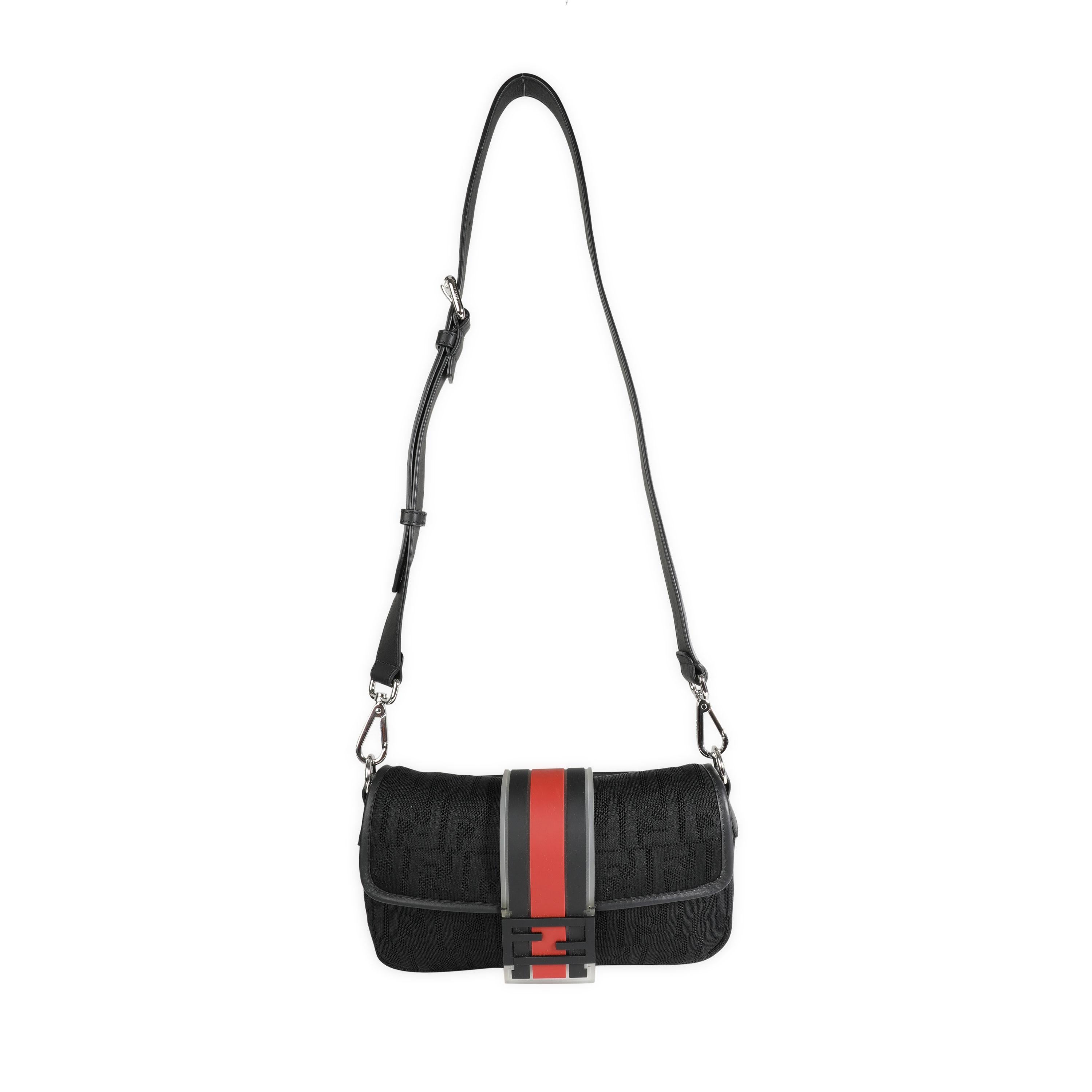Listing Title: Fendi Black Neoprene & Leather Baguette Messenger Bag
SKU: 118006
Condition: Pre-owned 
Condition Description: A Fendi classic. The Baguette bag is synonymous with the early 2000s and made a name for itself in an early episode of Sex