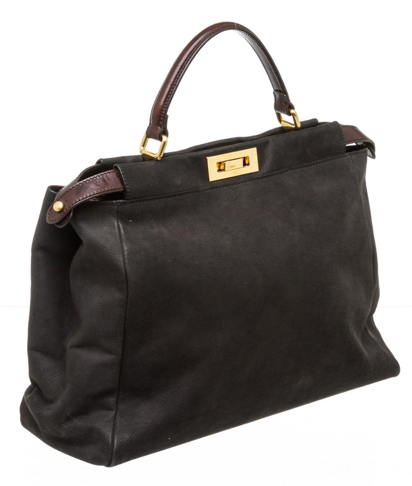 Fendi black nubuck Large Peekaboo satchel with gold-tone hardware, dual interior compartments with logo turn-lock closure, interior pocket with zip top, brown leather top handle.

16135MSC MKR