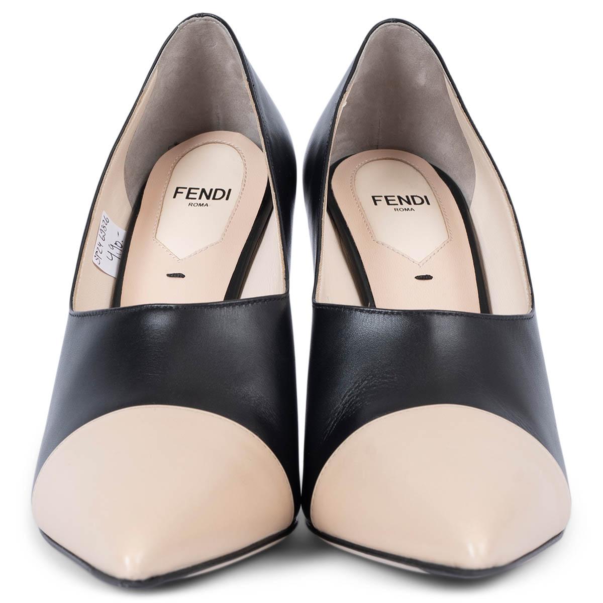 100% authentic Fendi pointed-toe pumps in black smooth leather with ivory cap toe. Have been worn once inside and are in virtually new condition. 

Measurements
Imprinted Size	38.5
Shoe Size	38.5
Inside Sole	25cm (9.8in)
Width	7.5cm