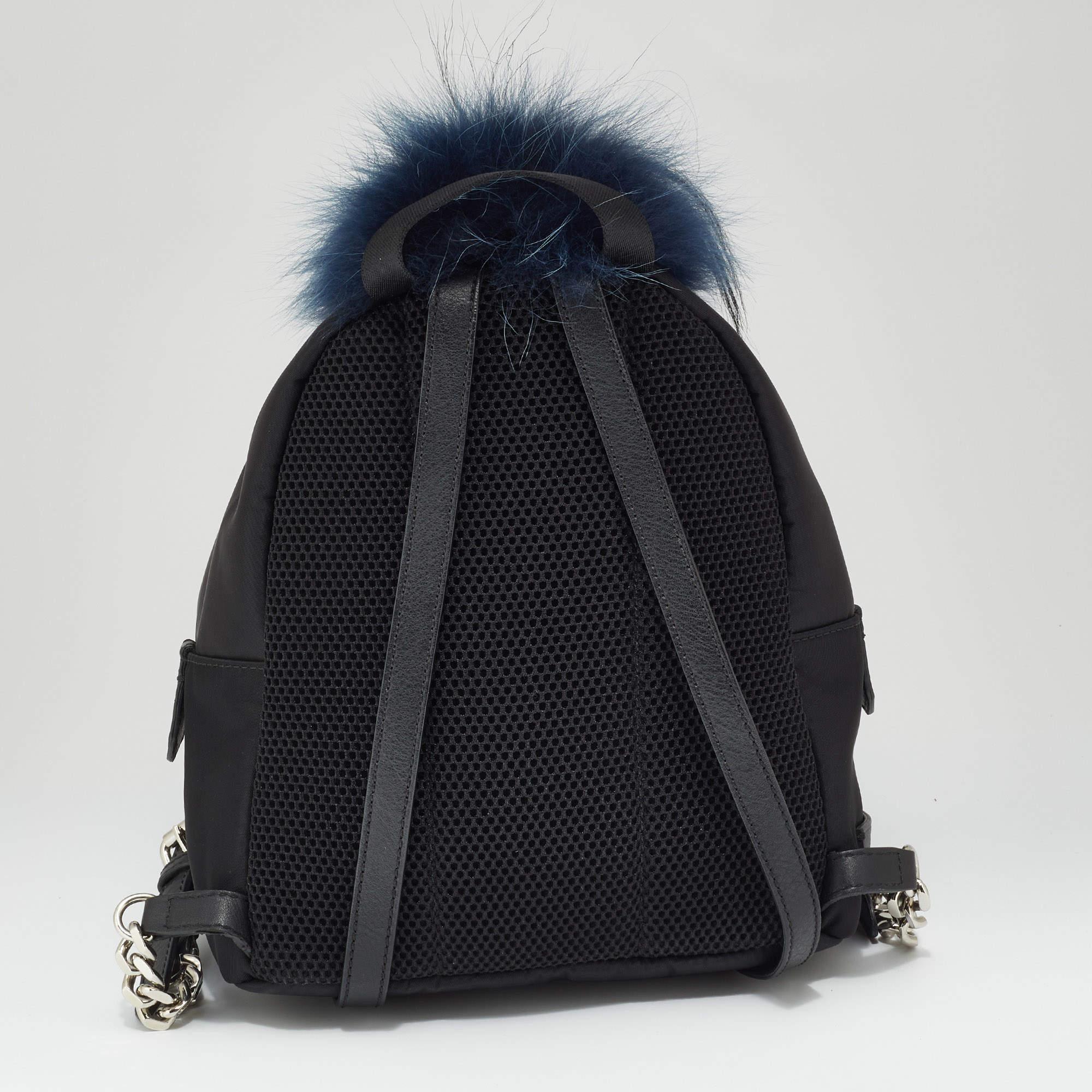 Fendi provides a fun alternative to your everyday bag. It is made of black nylon and leather. The backpack has zip compartments and stud details for a chic look.

