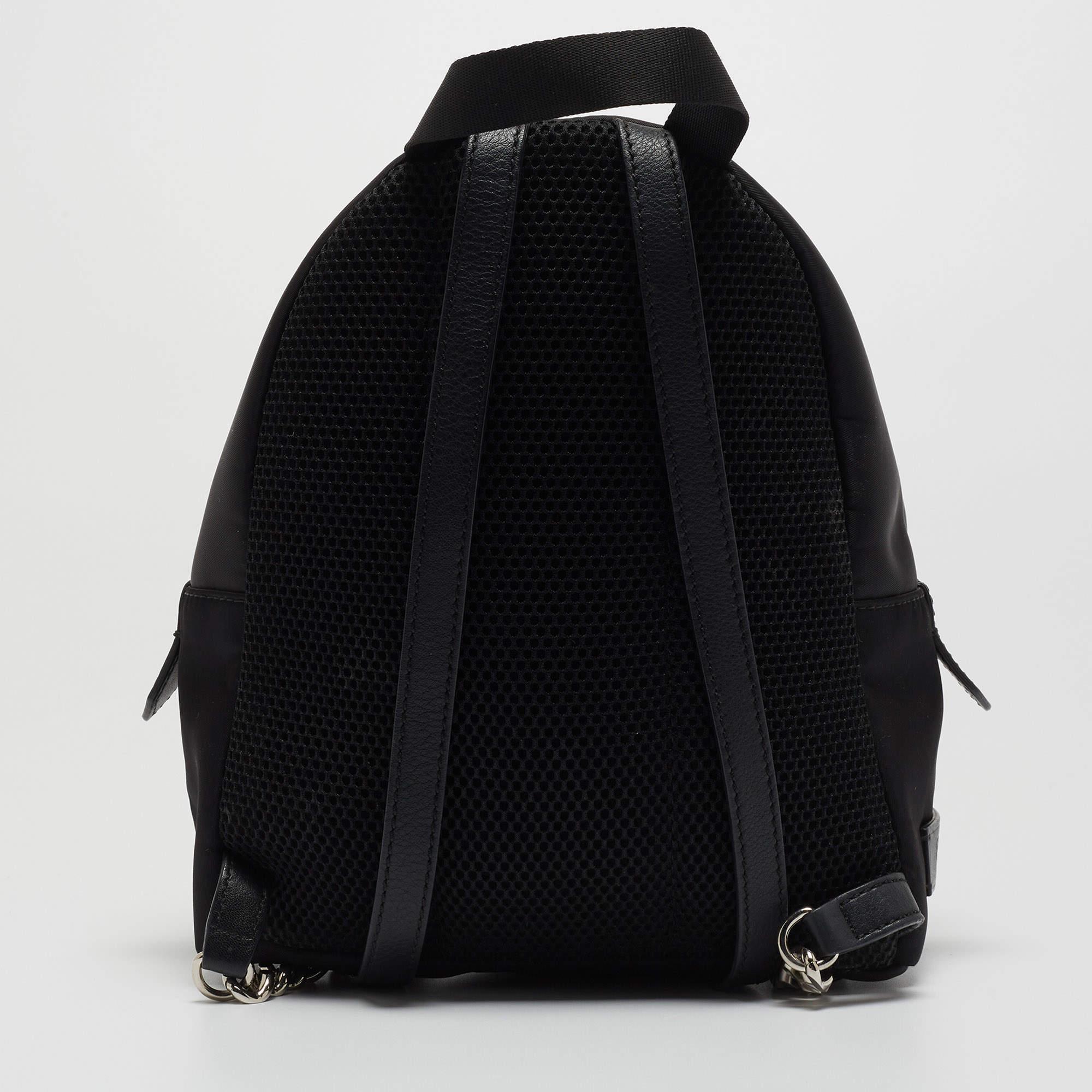 This practical and fashionable backpack will come in handy for daily use or as a style statement. It is smartly designed with a spacious interior for your belongings. Two shoulder straps make it ready to be yours.

Includes: Original Dustbag