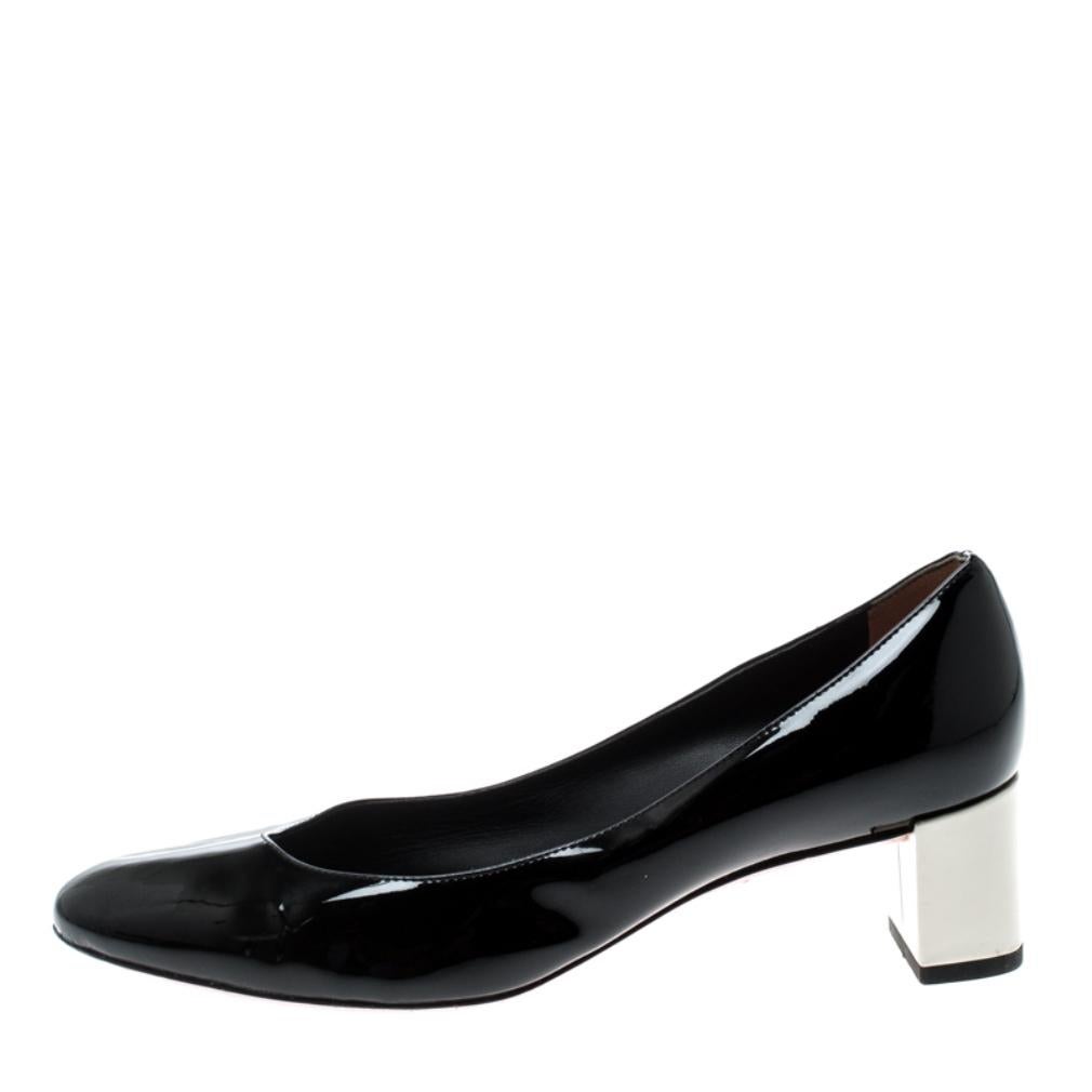 Comfort and fashion go hand in hand with these Eloise pumps from Fendi. These black pumps are crafted from patent leather and feature round toes, 5 cm block heels, and comfortable leather lined insoles. Pair them with jumpsuits or fitted trousers