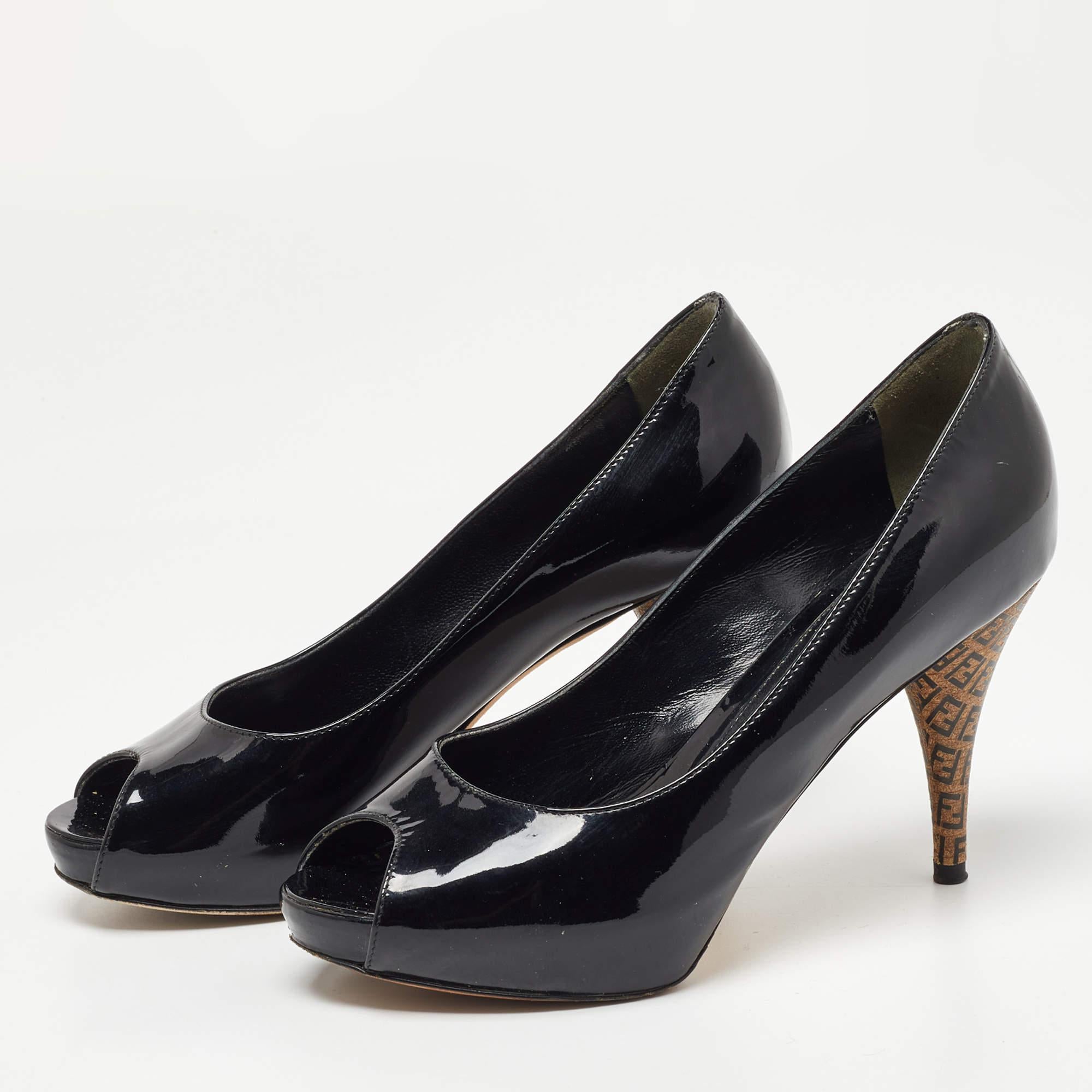 The house of Fendi brings you these impressive pumps that will complement any outfit. These beauties are crafted from patent leather and feature a peep toe silhouette. They come equipped with comfortable leather lined insoles and are elevated on the