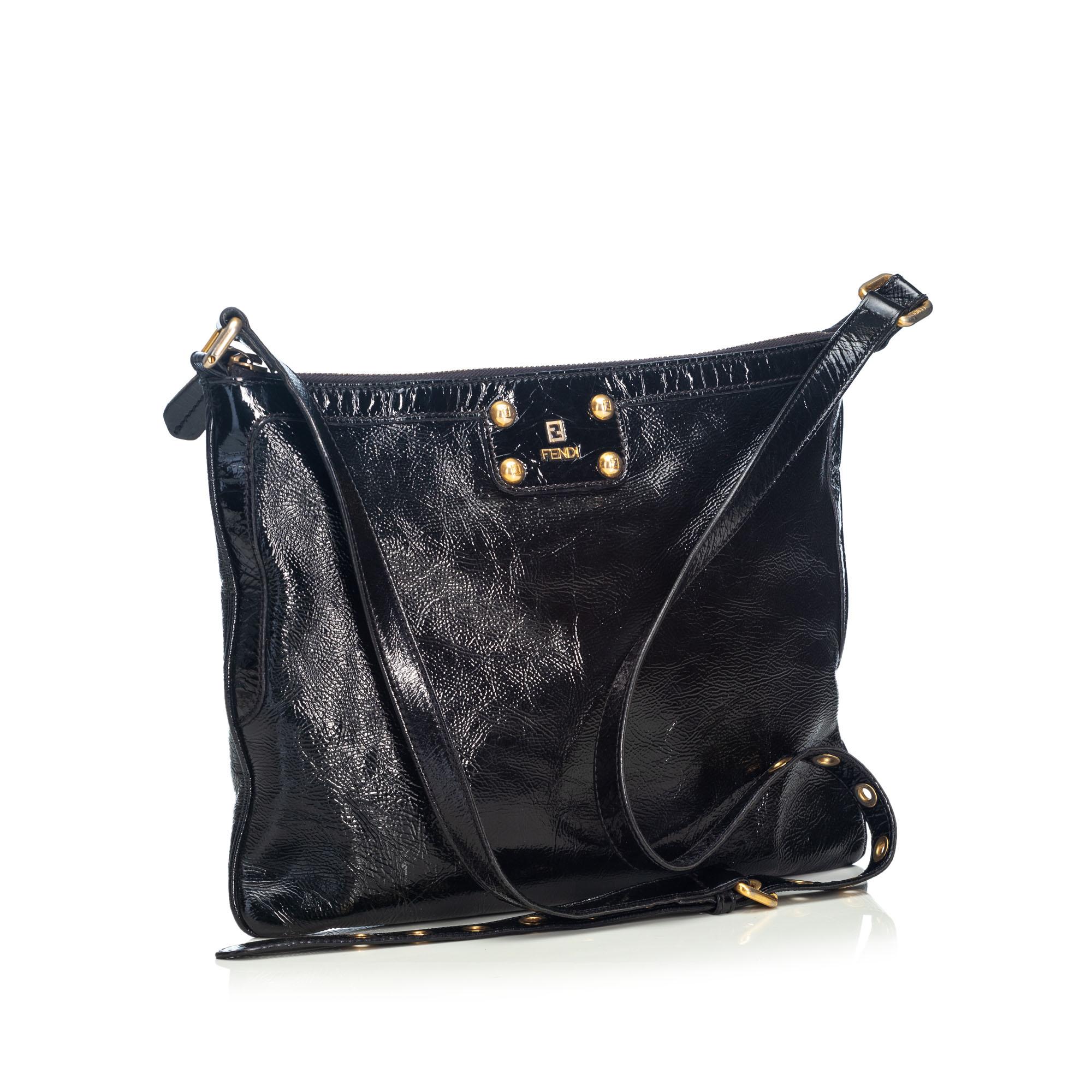 This crossbody bag features a patent leather body, a flat strap, a top zip closure, and an interior slip pocket. It carries as B+ condition rating.

Inclusions: 
This item does not come with inclusions.

Dimensions:
Length: 35.00 cm
Width: 27.00