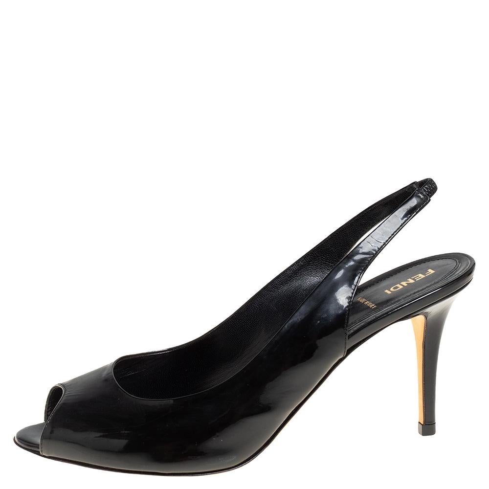 These stylish patent leather sandals stand out with their silhouette. These sandals come with slingback straps, peep toes and high heels. Stay fashionable throughout the day in these sandals by Fendi. This black pair is perfect for both casual and