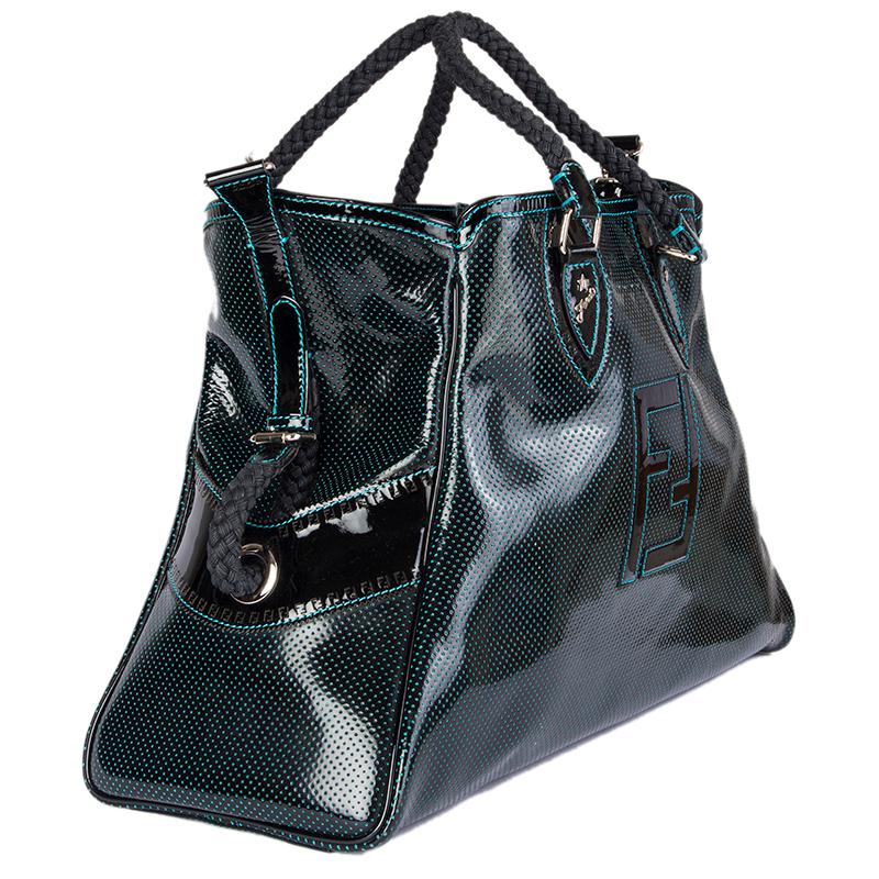 Fendi 'Du Jour Larger' shoulder bag in black perforated patent leather with turquoise stitching and lining. Closes with a belt and hook on top. Lined in turquoise with a zipper pocket against the back. Has been carried and is in excellent