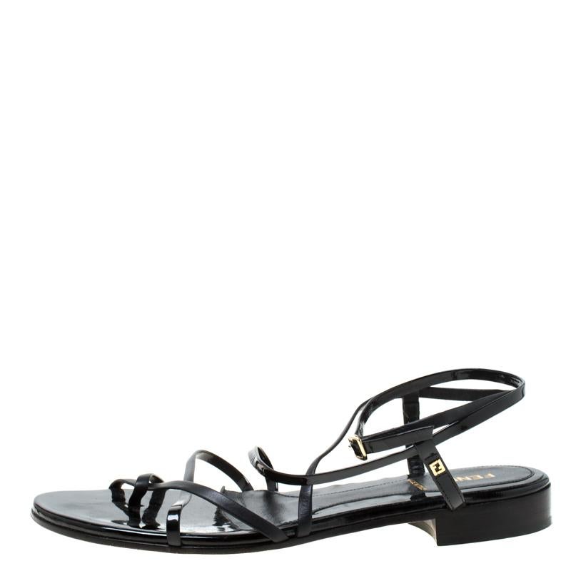 This gorgeous pair of flats made of patent leather adds a classic touch to your look. Team this leather sole pair with jeans and a blouse. Team your favorite outfit with these Fendi sandals for a subtle and stylish look. A pair of impressive black