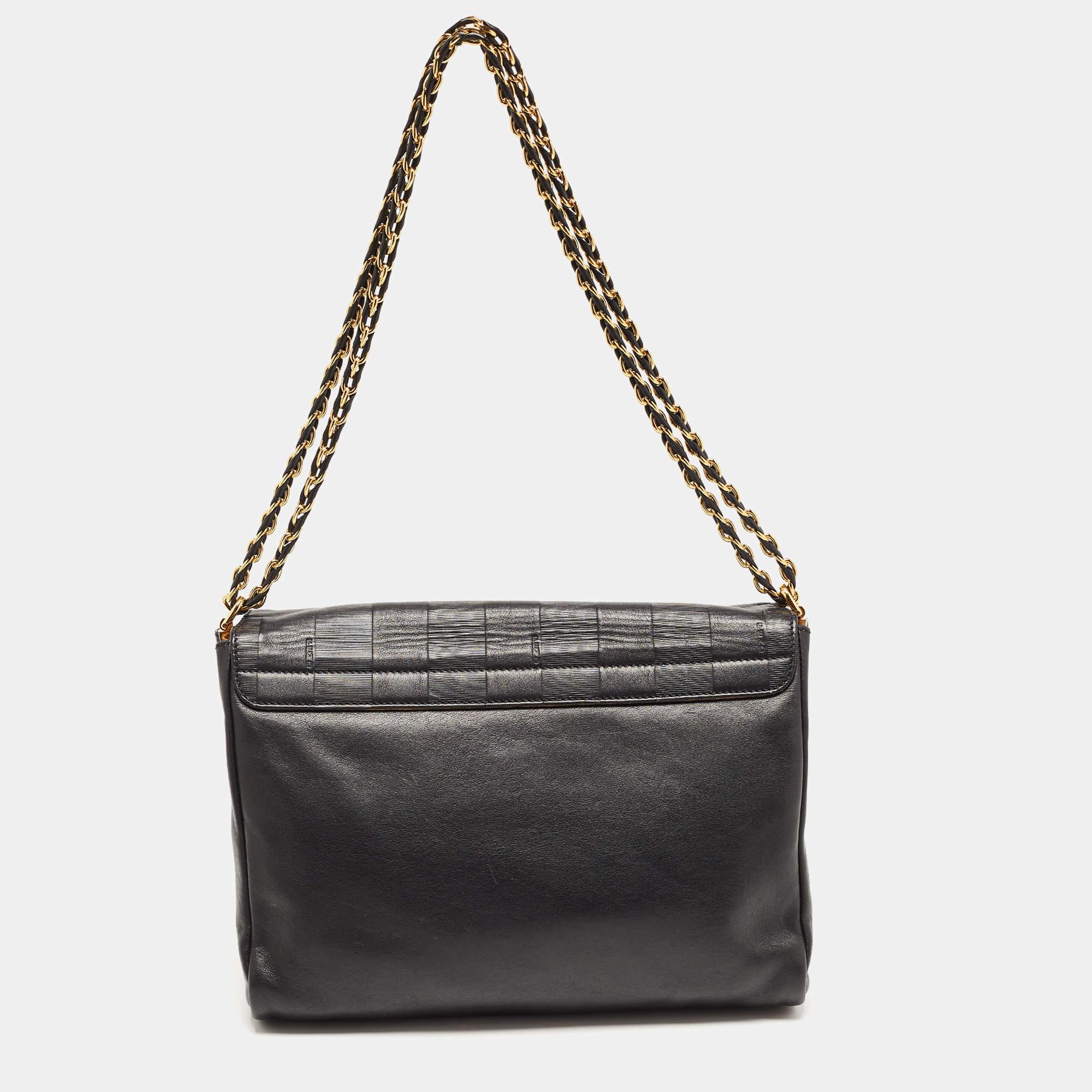 For a look that is complete with style, taste, and a touch of luxe, this designer bag is the perfect addition. Flaunt this beauty on your shoulder and revel in the taste of luxury it leaves you with.

Includes: Original Dustbag

