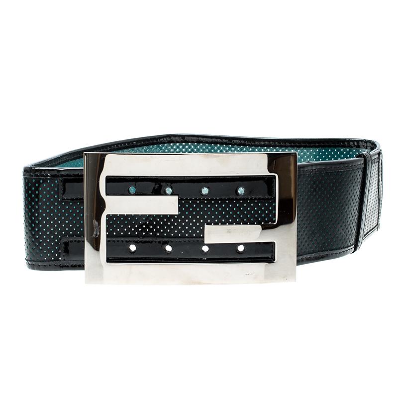 This belt from the house of Fendi features a wide silhouette and crafted in a black leather body. Detailed with perforations all over, this belt comes with a silver-tone 'FF' buckle closure. Wear yours with a dress or with your favourite pair of