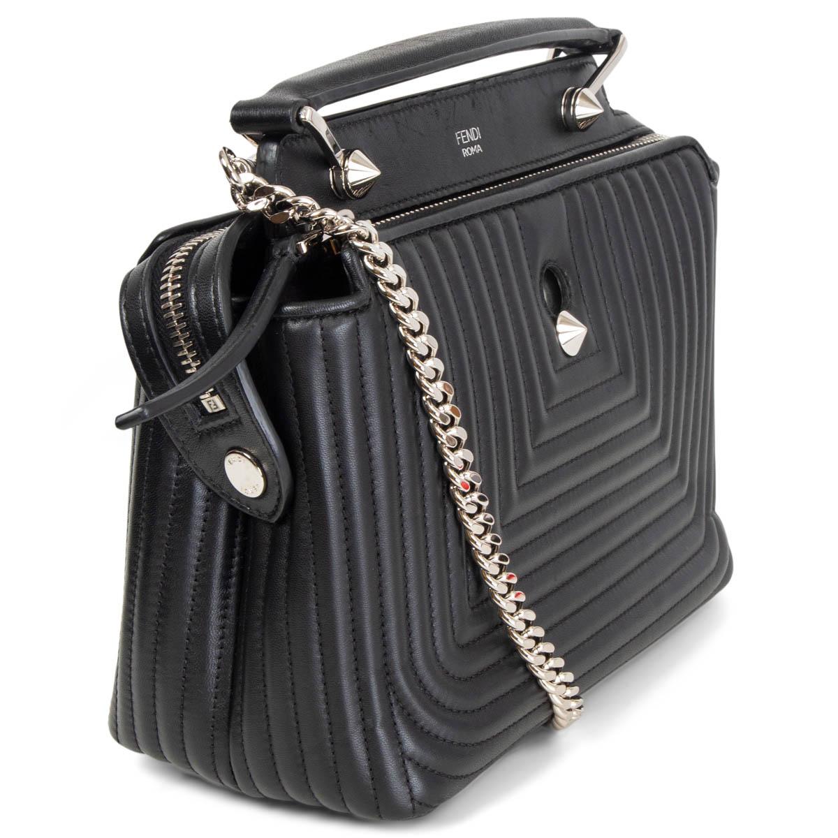 100% authentic Fendi Small Dotcom Click Shoulder Bag in soft black quilted lambskin leather and silver-tone hardware. This chic bag has two compartments and both sections have a zip closure and this particular bag comes with a black leather