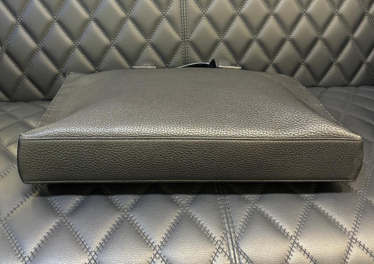 Classic Fendi black selleria leather briefcase tote. Perfect for work bag. Good condition overall, with rubbing on the bottom corners. Comes with leather tag, dust bag and care card. This model doesn’t come with strap.