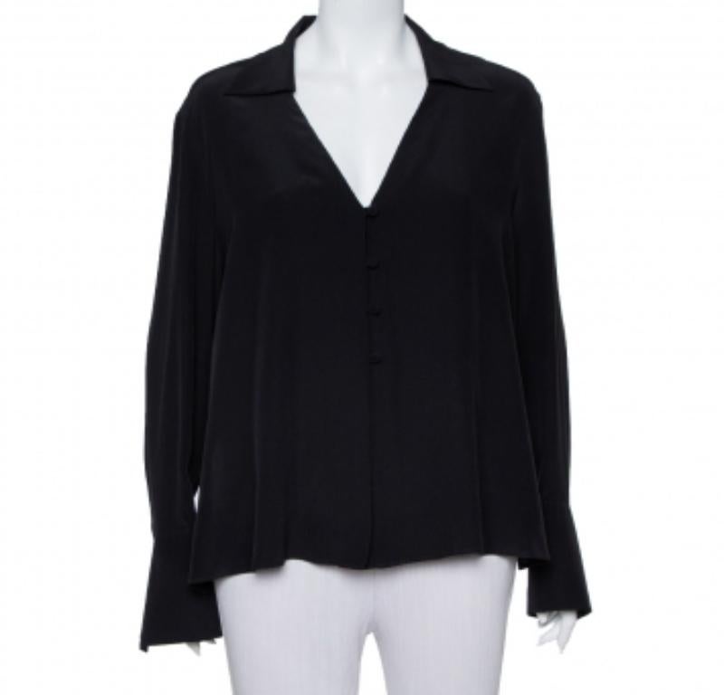 Exhibiting an elegant design, this Fendi top is a closet staple. A blacktop like this can be paired with different bottoms to finish your look elegantly. Pair this silk top with high-waisted bottoms and gold accessories for a chic look.