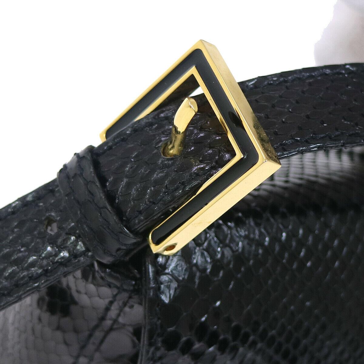 Fendi Black Snakeskin Charm Logo Top Handle Satchel Evening Flap Shoulder Bag

Snakeskin
Gold tone hardware
Leather lining
Snap closure
Adjustable shoulder strap 4.25-6.25